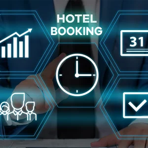 Handwritten list on a notepad titled Hotel Reservation Mistakes, detailing common travel errors next to a pen on a wooden desk.