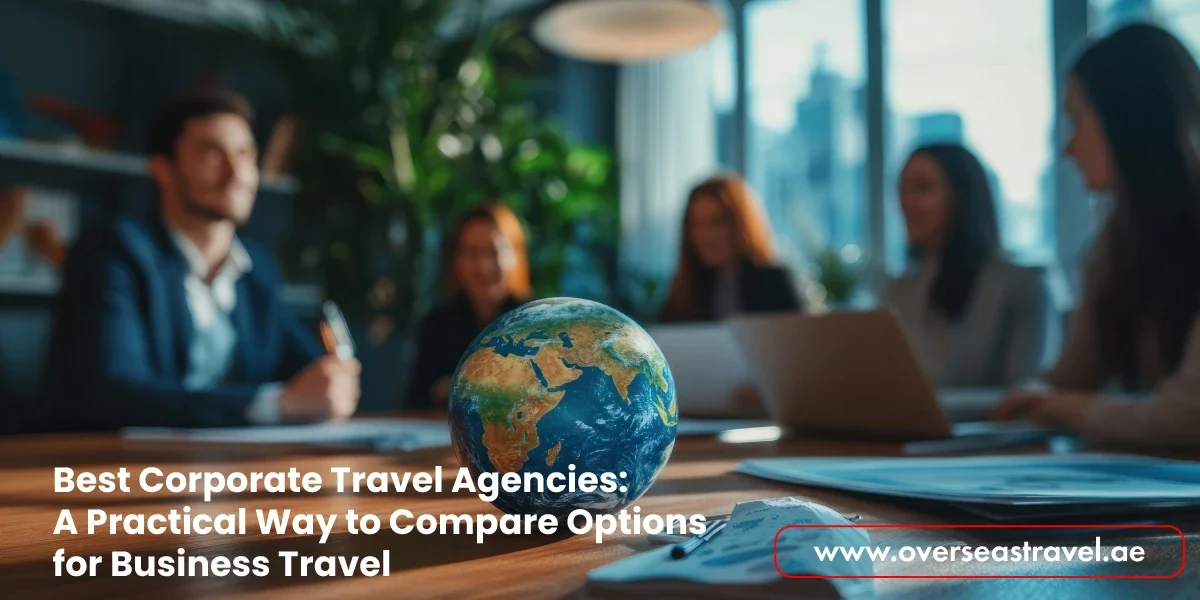 A globe on a conference table with professionals in the background, representing global corporate travel agencies.