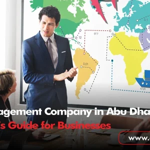 A professional presenter in a suit stands before a world map graphic illustrating global logistics and transport icons, discussing corporate travel solutions with a team in a boardroom.